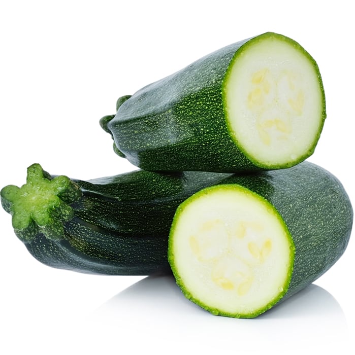 Green zucchini in a pile