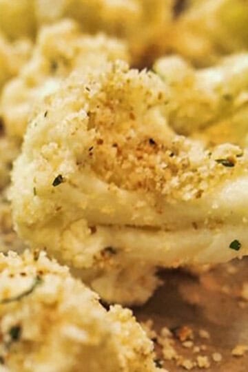Roasted cauliflower coated in herbs and breadcrumbs.