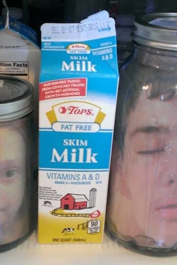 Looking for a super-creepy DIY decoration or prank? Here's how to put a head in a jar for Halloween! I give you step-by-step instruction on how to make it look like someone's head is floating in a jar of glowing, murky water. #Halloween #HalloweenDecor #prank #DIY