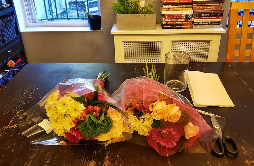 Two bouquets of grocery store flowers.