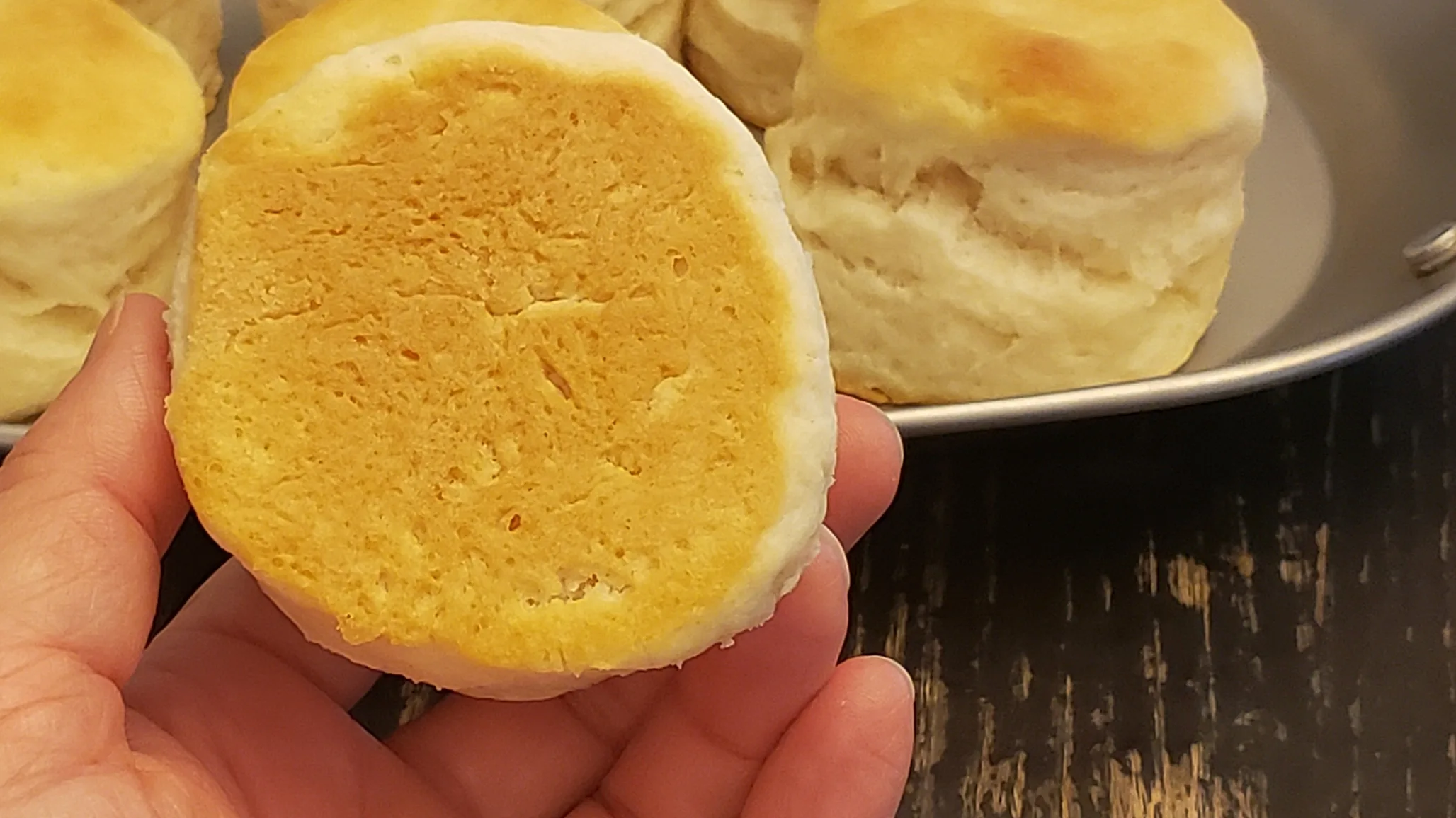The golden bottom of a homemade biscuit.