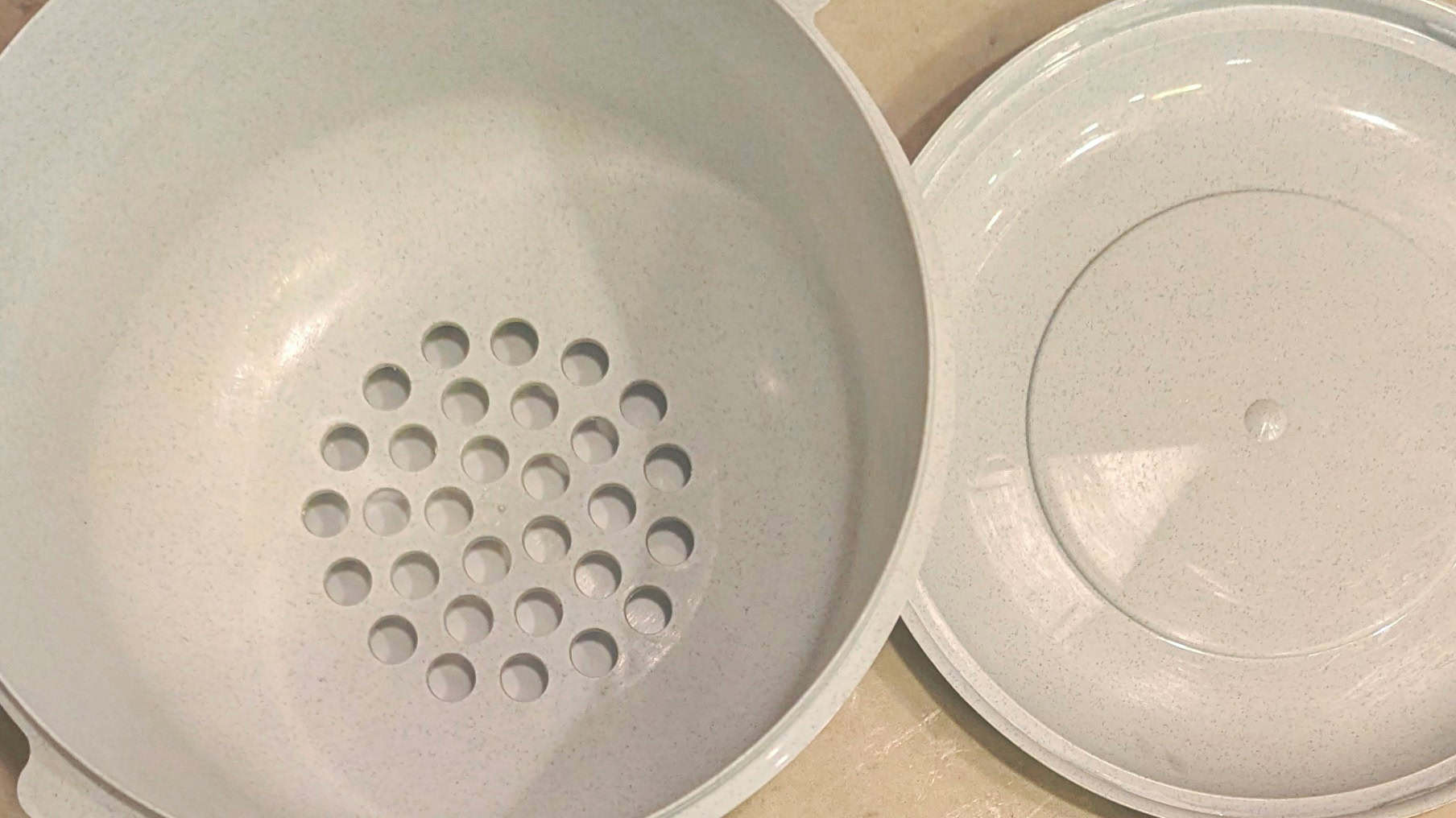 A popcorn sifter bowl.